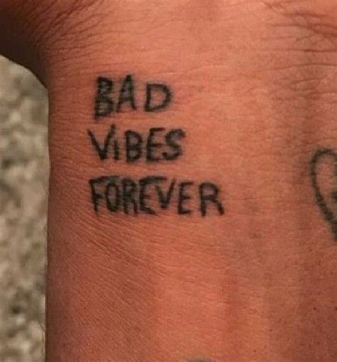 Unleash Your Edgy Side with Bad Vibes Forever Tattoo!